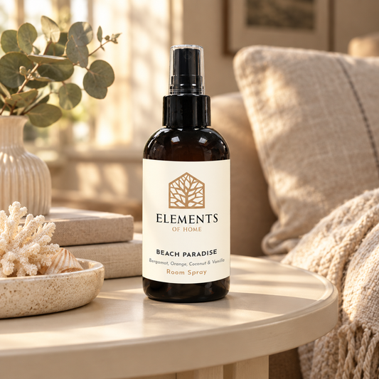Beach Paradise room spray on a side table in a sunlit living room – Elements of Fragrance