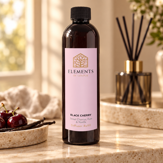 Black Cherry reed diffuser refill bottle beside a reed diffuser – Elements of Fragrance