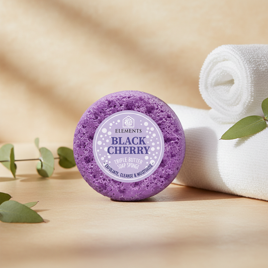 Black Cherry triple butter soap sponge on a bathroom shelf with white towels – Elements of Fragrance