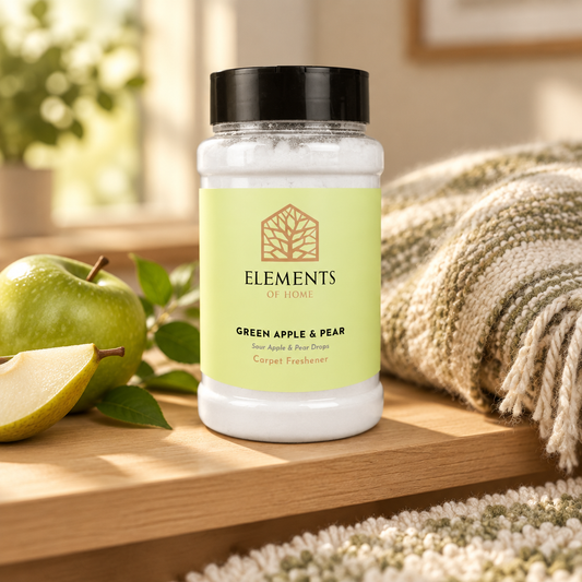 Green Apple & Pear scented carpet sprinkles shaker tub on a wooden shelf with cosy throws – Elements of Fragrance