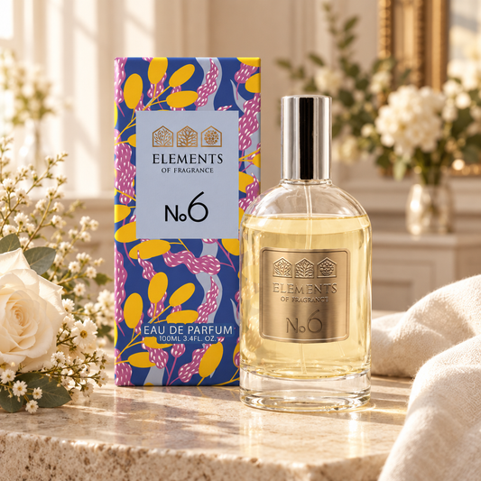 No06 Inspired by Lady Millions 100ml eau de parfum styled on a marble table in a sunlit room – Elements of Fragrance