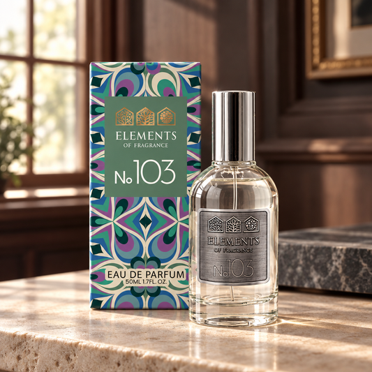 No103 Inspired by Aventus 50ml eau de parfum styled on a marble table in a sunlit room – Elements of Fragrance