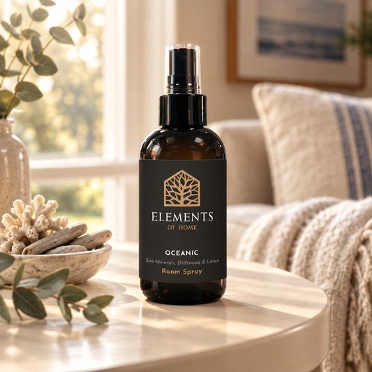 Oceanic 150ml room spray on a side table in a sunlit living room – Elements of Fragrance