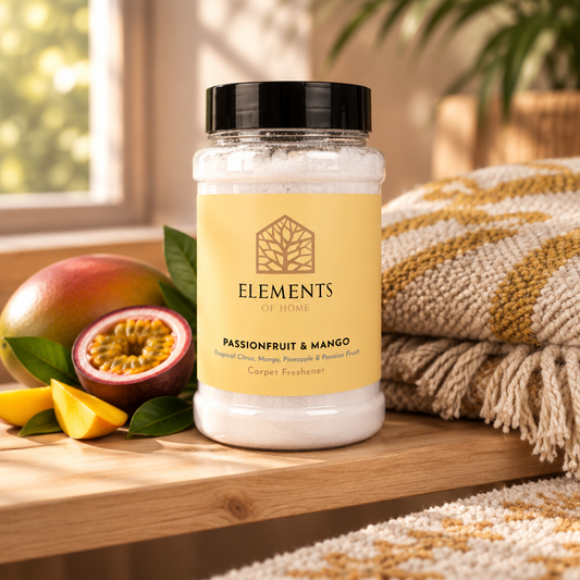 Passionfruit & Mango scented carpet sprinkles shaker tub on a wooden shelf with cosy throws – Elements of Fragrance