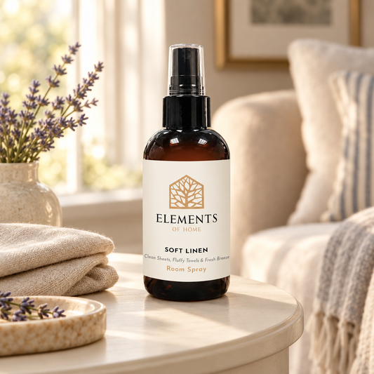 Soft Linen room spray on a side table in a sunlit living room – Elements of Fragrance