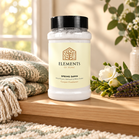 Spring Dawn scented carpet sprinkles shaker tub on a wooden shelf with cosy throws – Elements of Fragrance