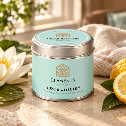Yuzu & Waterlily scented candle in a 180g tin styled with fresh ingredients – Elements of Fragrance