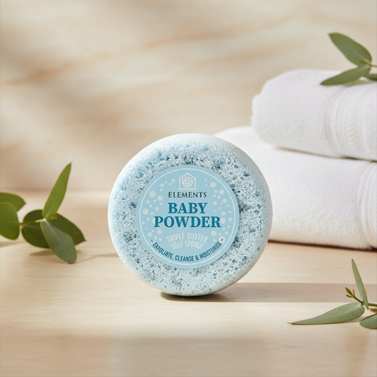 Baby Powder triple butter soap sponge on a bathroom shelf with white towels – Elements of Fragrance