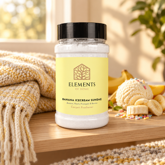 Banana Icecream Sundae scented carpet sprinkles shaker tub on a wooden shelf with cosy throws – Elements of Fragrance