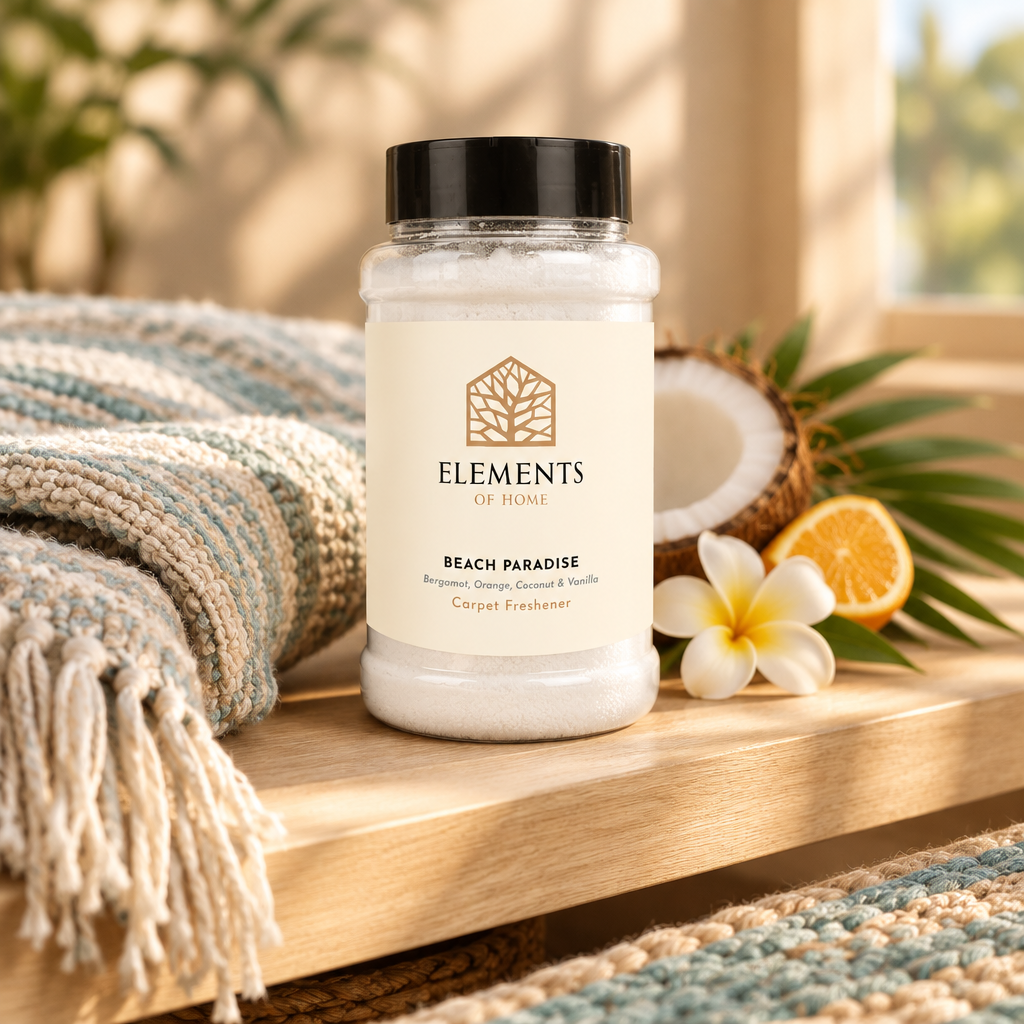 Beach Paradise scented carpet sprinkles shaker tub on a wooden shelf with cosy throws – Elements of Fragrance