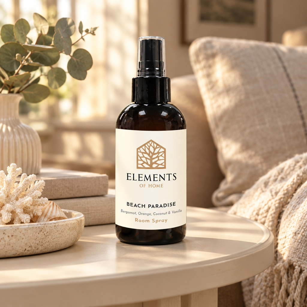Beach Paradise room spray on a side table in a sunlit living room – Elements of Fragrance