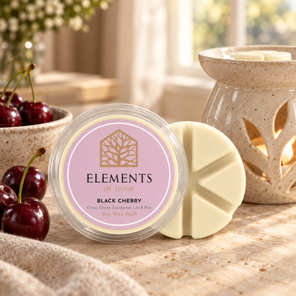 Black Cherry 50g soy wax melt snap pot beside a lit ceramic wax burner – Elements of Fragrance