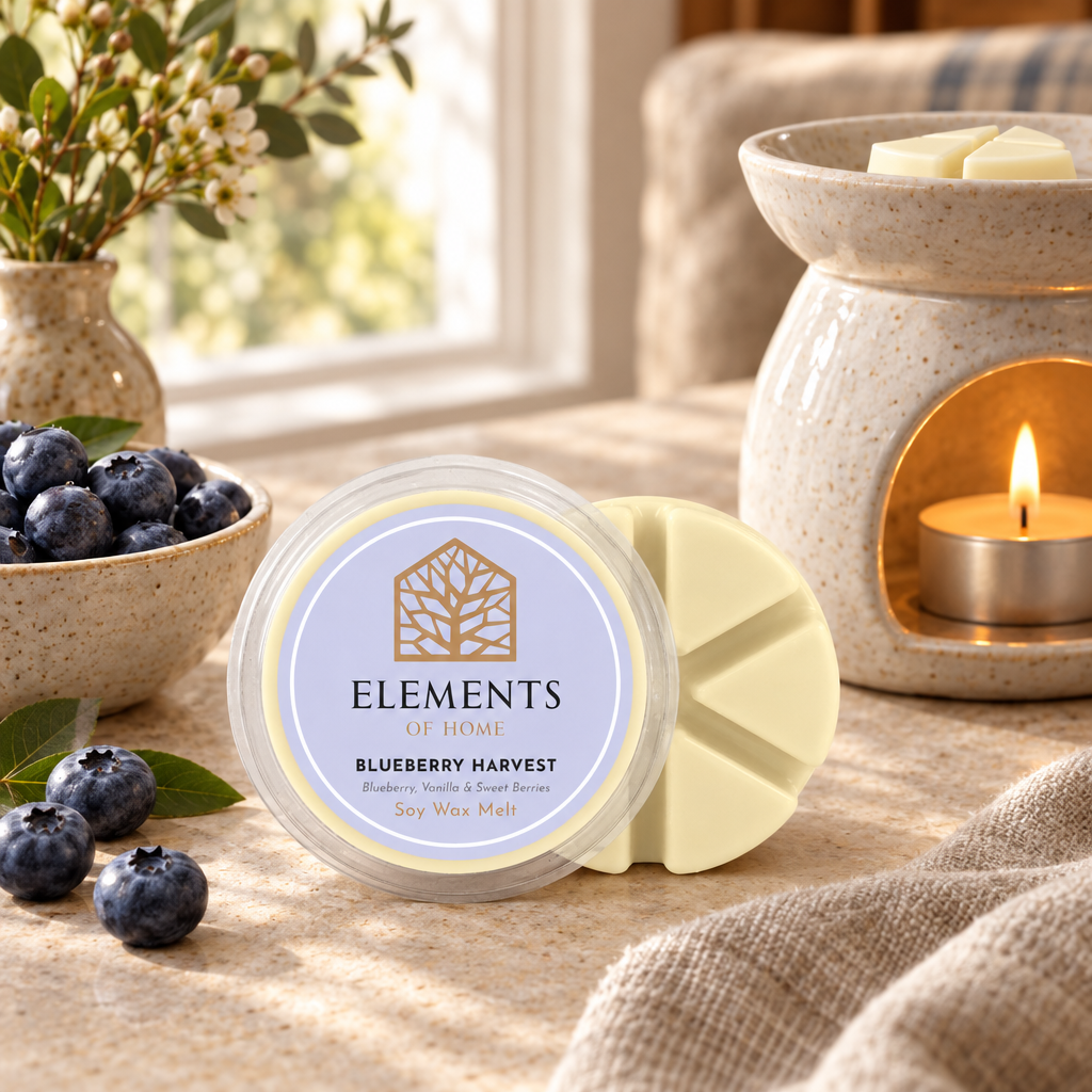 Blueberry Harvest 50g soy wax melt snap pot beside a lit ceramic wax burner – Elements of Fragrance