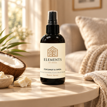 Coconut & Shea room spray on a side table in a sunlit living room – Elements of Fragrance