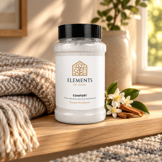 Comfort scented carpet sprinkles shaker tub on a wooden shelf with cosy throws – Elements of Fragrance