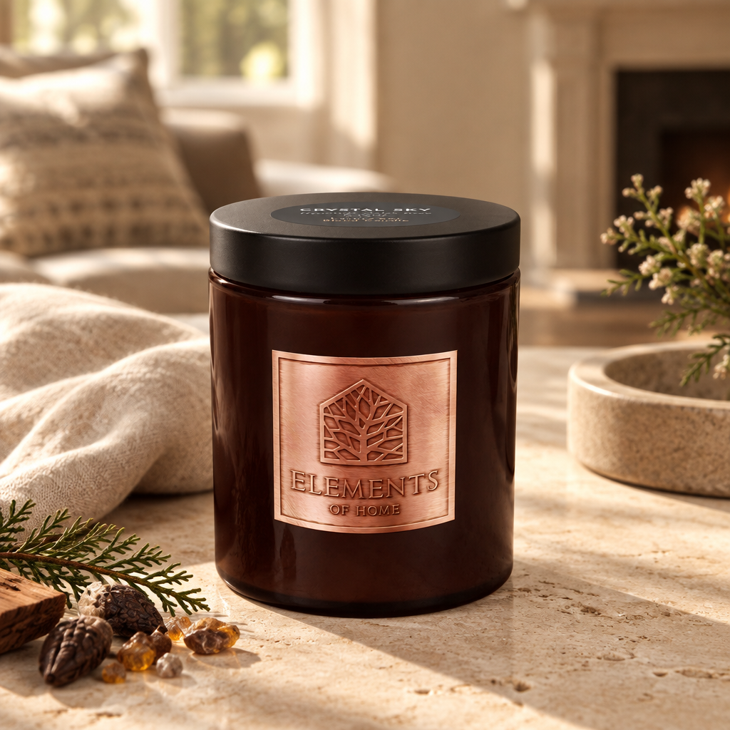 Crystal Sky 140g luxury candle in an amber glass jar in a cosy living room – Elements of Fragrance