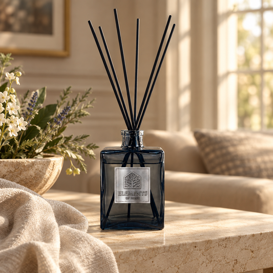 Crystal Sky 200ml luxury reed diffuser in a black glass bottle styled in a sunlit living room – Elements of Fragrance