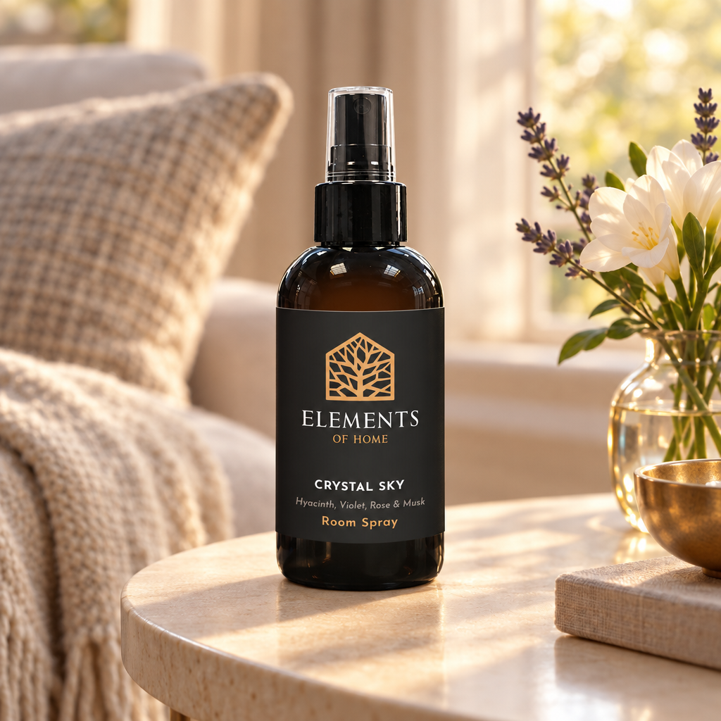 Crystal Sky 150ml room spray on a side table in a sunlit living room – Elements of Fragrance