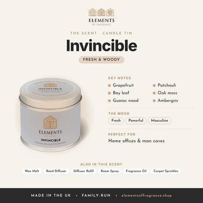 Invincible Candle Tin scent profile: fresh & woody with notes of grapefruit, bay leaf, guaiac wood, patchouli, oak moss, ambergris