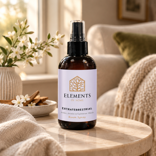 Extraterrestrial room spray on a side table in a sunlit living room – Elements of Fragrance