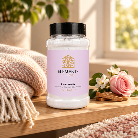 Fairy Glow scented carpet sprinkles shaker tub on a wooden shelf with cosy throws – Elements of Fragrance