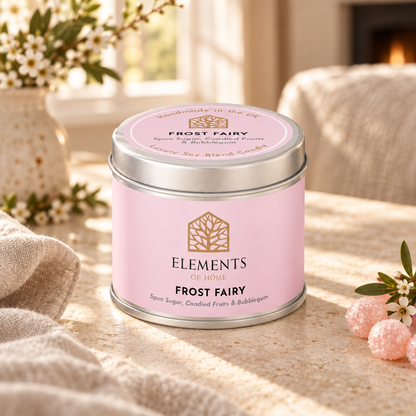 Frost Fairy scented candle in a 180g tin styled with fresh ingredients – Elements of Fragrance