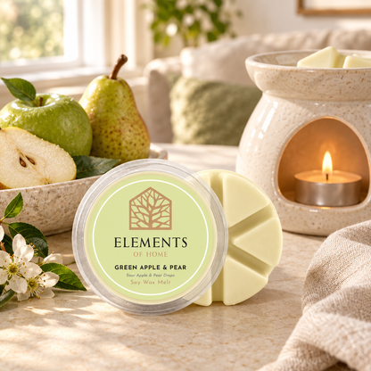 Green Apple & Pear 50g soy wax melt snap pot beside a lit ceramic wax burner – Elements of Fragrance