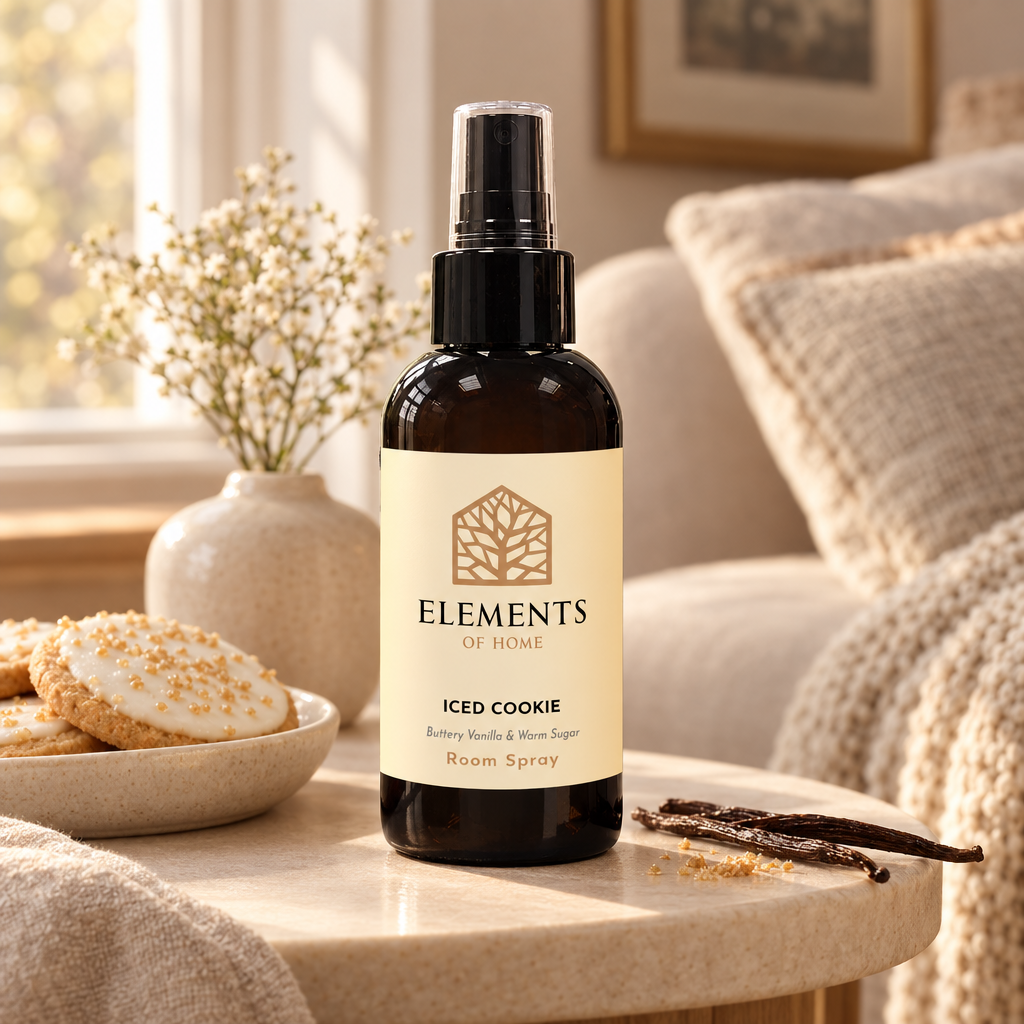 Iced Cookie room spray on a side table in a sunlit living room – Elements of Fragrance