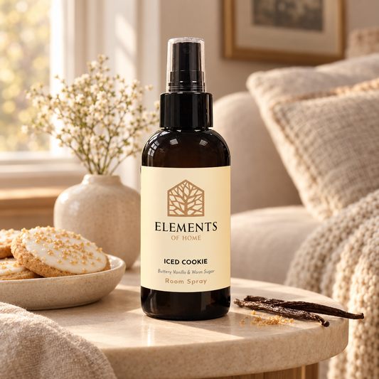 Iced Cookie room spray on a side table in a sunlit living room – Elements of Fragrance