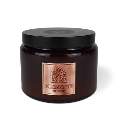 Igneous 413g luxury candle in an amber glass jar with copper label – Elements of Fragrance