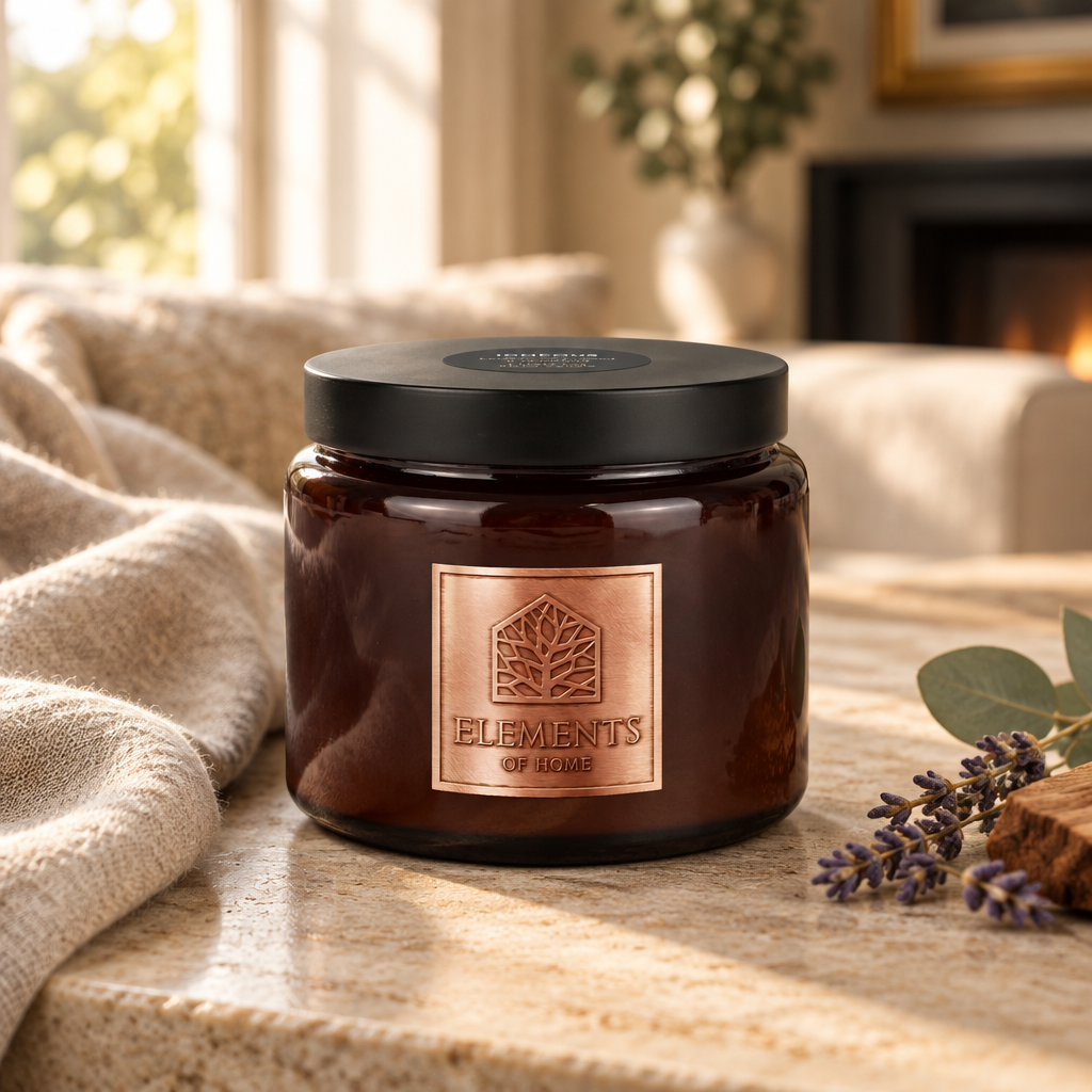 Igneous 413g luxury candle in an amber glass jar in a cosy living room – Elements of Fragrance
