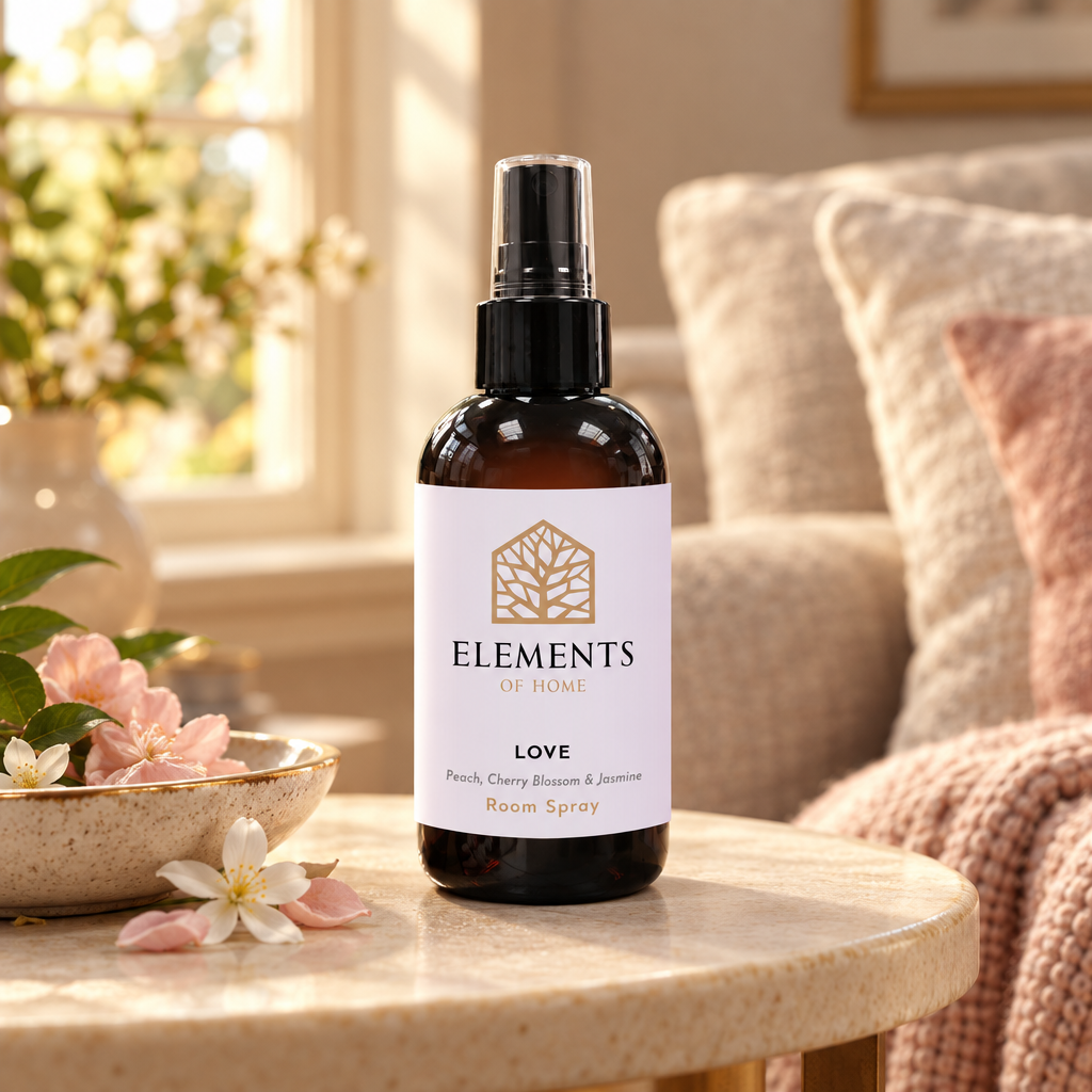 Love room spray on a side table in a sunlit living room – Elements of Fragrance