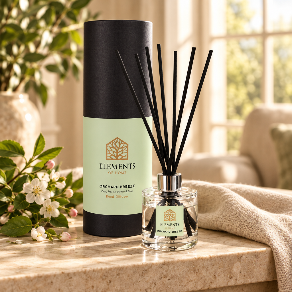 Orchard Breeze 100ml reed diffuser with black reeds styled in a sunlit living room – Elements of Fragrance