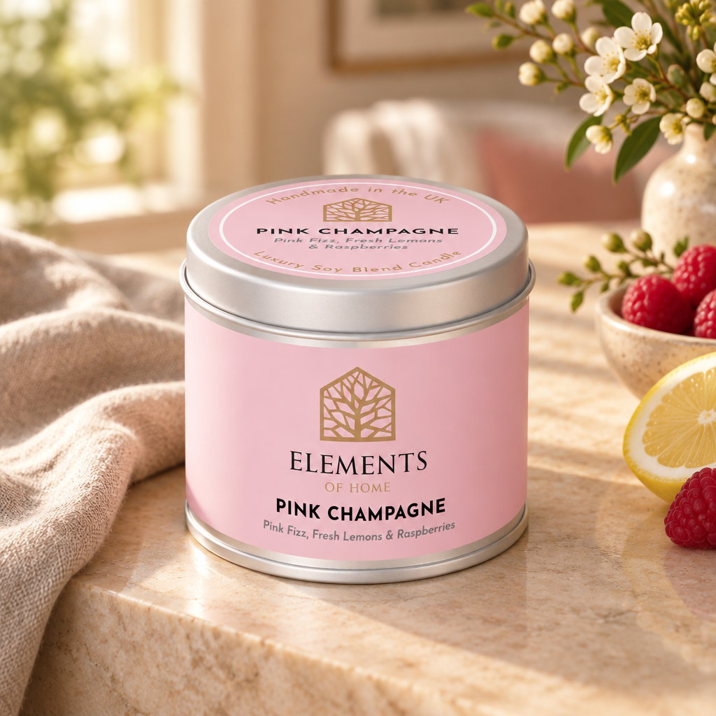 Pink Champagne scented candle in a 180g tin styled with fresh ingredients – Elements of Fragrance