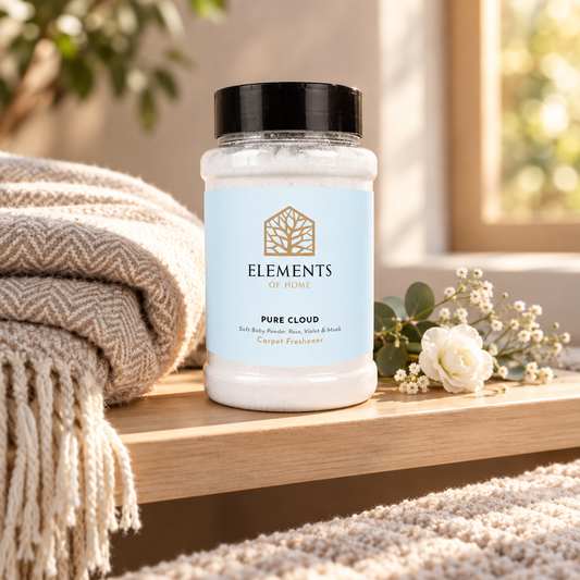 Pure Cloud scented carpet sprinkles shaker tub on a wooden shelf with cosy throws – Elements of Fragrance