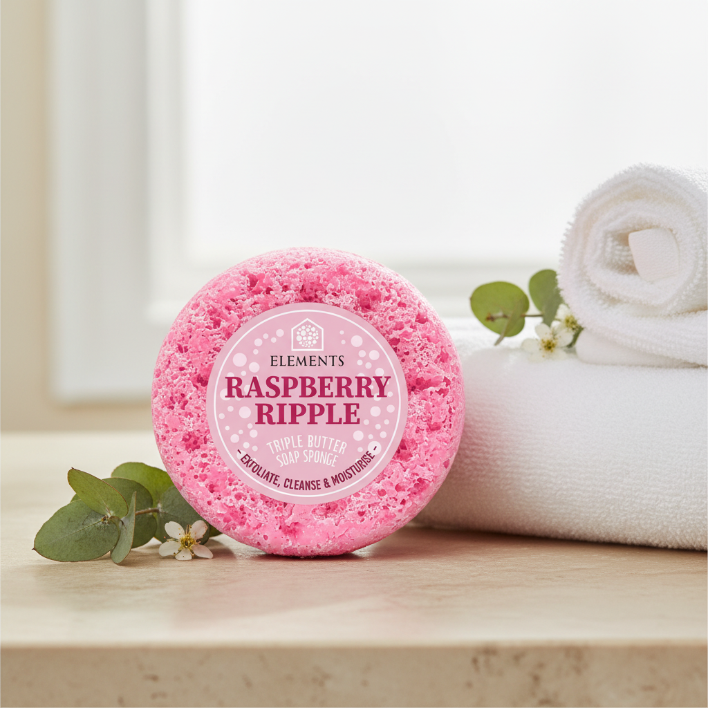 Raspberry Ripple triple butter soap sponge on a bathroom shelf with white towels – Elements of Fragrance