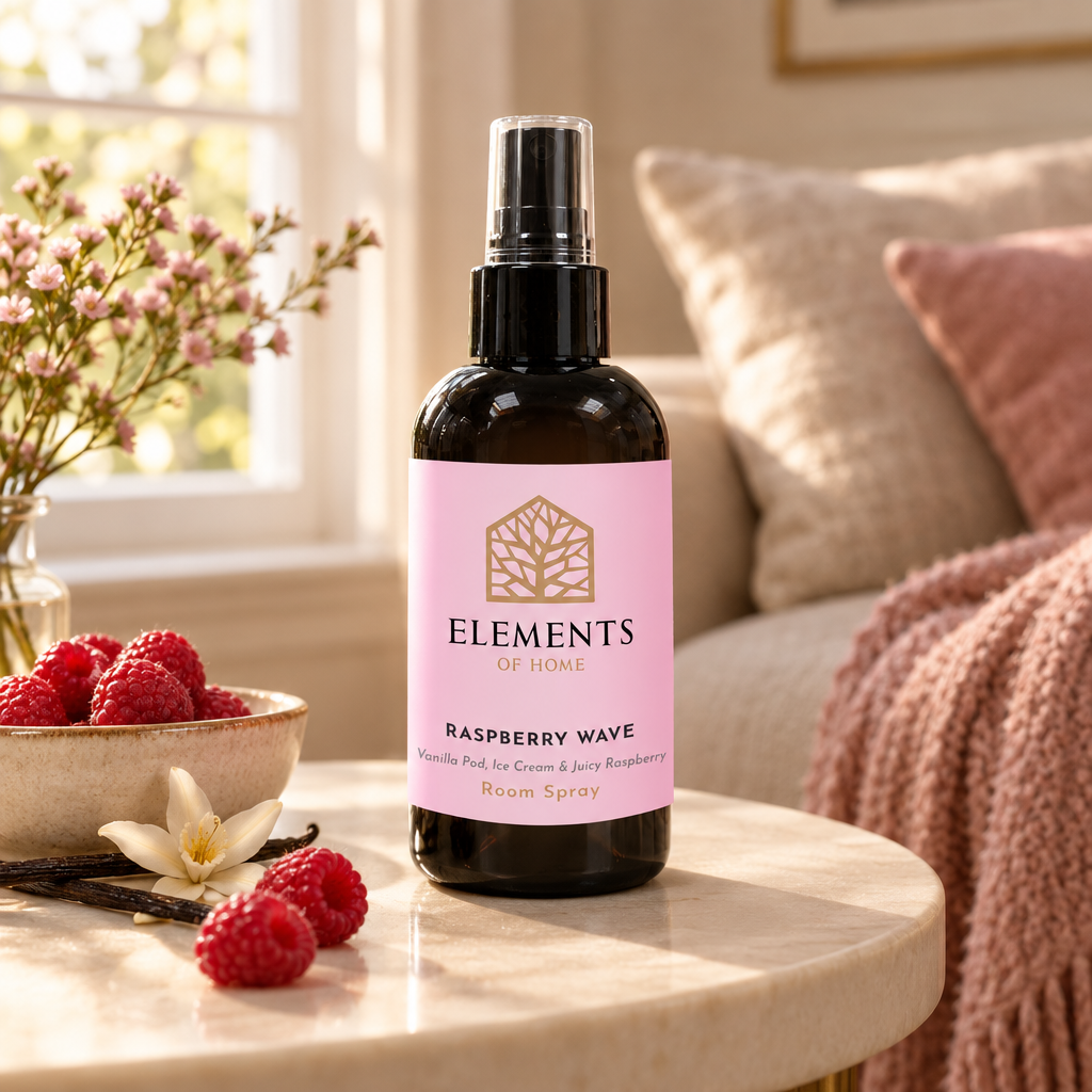 Raspberry Wave room spray on a side table in a sunlit living room – Elements of Fragrance