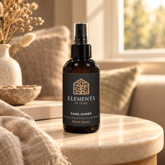 Sand Dunes 150ml room spray on a side table in a sunlit living room – Elements of Fragrance