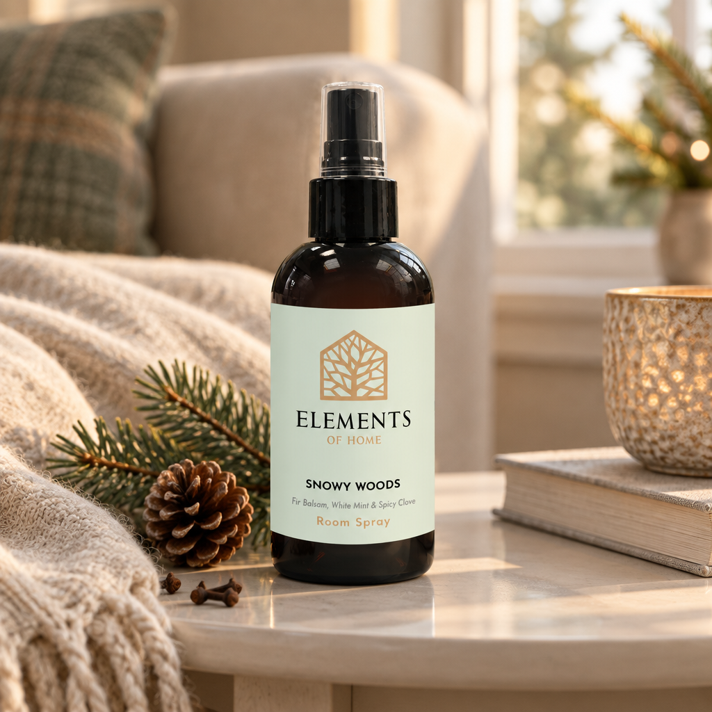Snowy Woods room spray on a side table in a sunlit living room – Elements of Fragrance