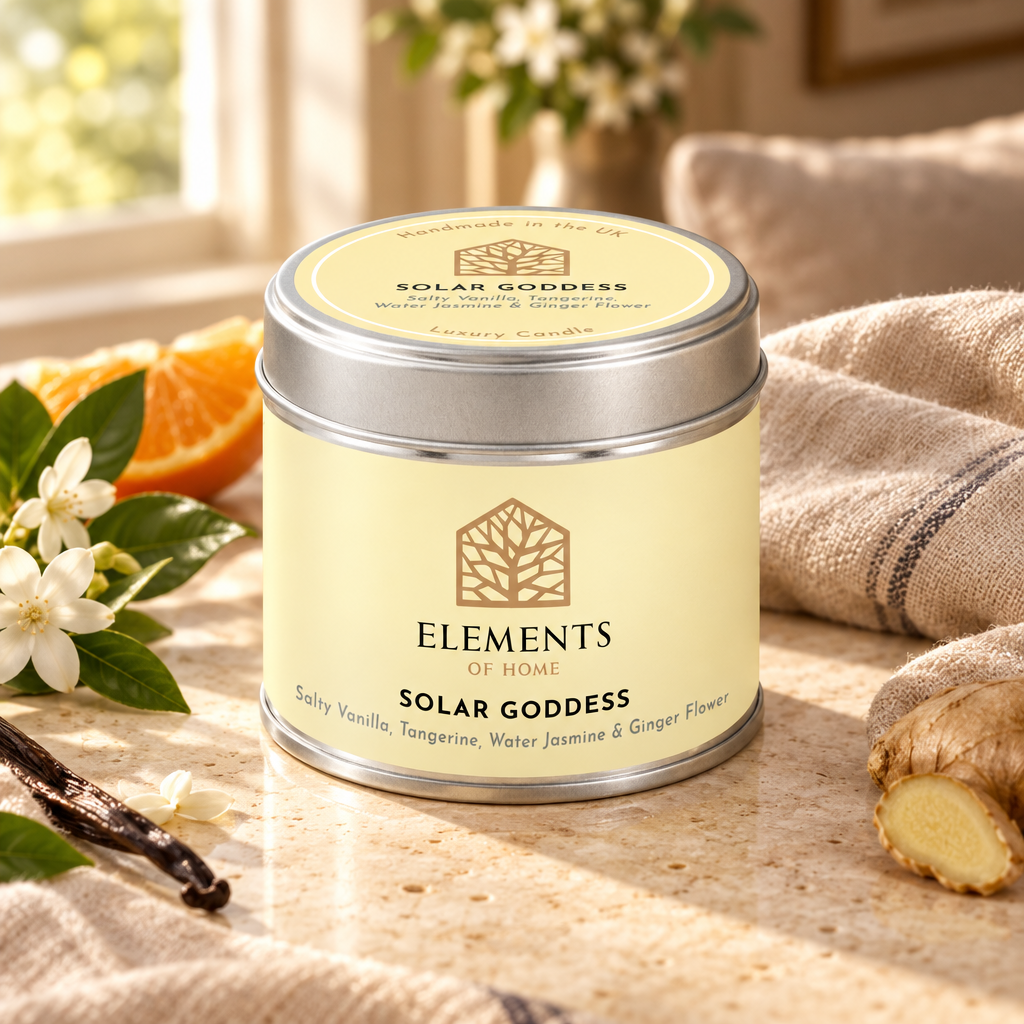 Solar Goddess scented candle in a 180g tin styled with fresh ingredients – Elements of Fragrance
