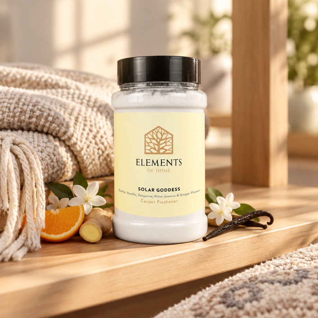 Solar Goddess scented carpet sprinkles shaker tub on a wooden shelf with cosy throws – Elements of Fragrance