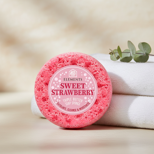 Sweet Strawberry triple butter soap sponge on a bathroom shelf with white towels – Elements of Fragrance
