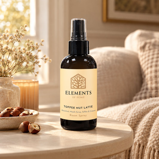 Toffee Nut Latte room spray on a side table in a sunlit living room – Elements of Fragrance