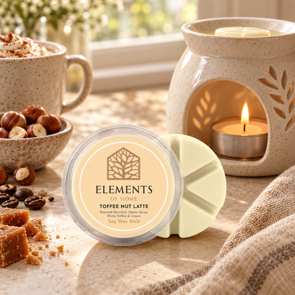 Toffee Nut Latte 50g soy wax melt snap pot beside a lit ceramic wax burner – Elements of Fragrance