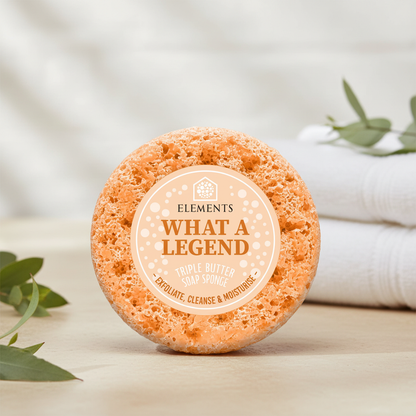 What a Legend triple butter soap sponge on a bathroom shelf with white towels – Elements of Fragrance