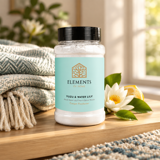 Yuzu & Waterlily scented carpet sprinkles shaker tub on a wooden shelf with cosy throws – Elements of Fragrance