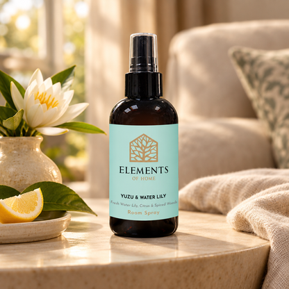 Yuzu & Waterlily room spray on a side table in a sunlit living room – Elements of Fragrance
