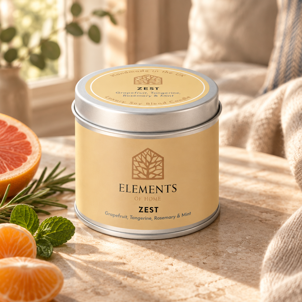 Zest scented candle in a 180g tin styled with fresh ingredients – Elements of Fragrance